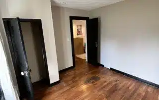 White walls, black trim, doors, and wood floors how many coats of paint