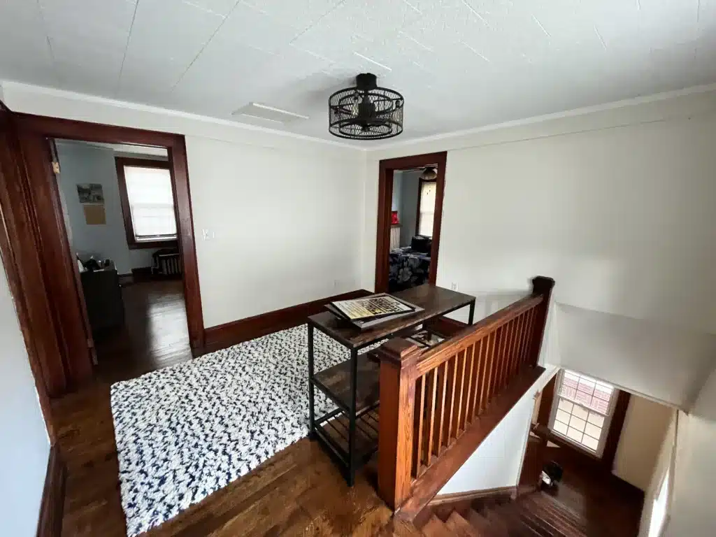 IMG_7937 White walls and ceiling with stained wooden trim